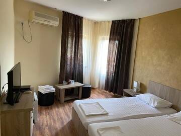 Фото номера Двухместный номер с 1 кроватью и балконом Гостевой дом Pensiunea Casa Soarelui г. Şimian 2